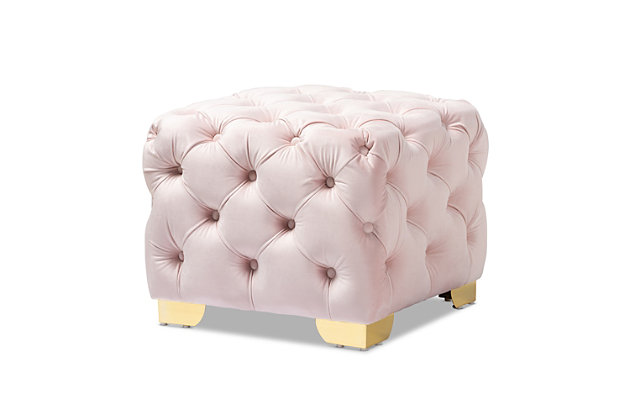 Raise your standard of living with this ottoman upholstered in a soft, sumptuous velvet fabric. Reserved exclusively for those with a penchant for high-glam home decor, this ultra-chic ottoman is dressed to impress with all over button tufting and lustrous goldtone-finished metal legs that simply works. Easy-on-the-eyes and alluring to the touch, this decidedly elegantly and versatile ottoman can be used as a coffee table, footstool or as extra seating for guests.Engineered wood frame | Light pink velvet upholstery | No assembly required