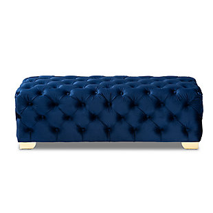 Raise your standard of living with this ottoman bench upholstered in a soft, sumptuous velvet fabric. Reserved exclusively for those with a penchant for high-glam home decor, this ultra-chic bench is dressed to impress with all-over button tufting and lustrous goldtone finished metal feet that simply work. Easy on the eyes and alluring to the touch, this decidedly elegant and versatile bench can be placed anywhere from the entryway to the foot of the bed.Engineered wood frame | Metal feet | Royal blue velvet upholstery | No assembly required