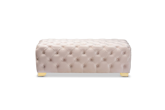 Raise your standard of living with this ottoman bench upholstered in a soft, sumptuous velvet fabric. Reserved exclusively for those with a penchant for high-glam home decor, this ultra-chic bench is dressed to impress with all-over button tufting and lustrous goldtone finished metal feet that simply work. Easy on the eyes and alluring to the touch, this decidedly elegant and versatile bench can be placed anywhere from the entryway to the foot of the bed.Engineered wood frame | Metal feet | Light beige velvet upholstery | No assembly required