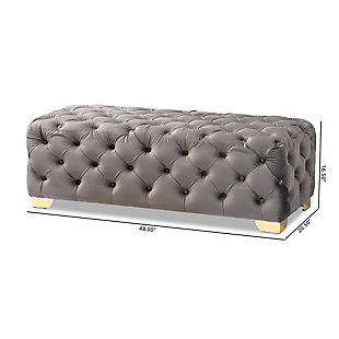 Raise your standard of living with this ottoman bench upholstered in a soft, sumptuous velvet fabric. Reserved exclusively for those with a penchant for high-glam home decor, this ultra-chic bench is dressed to impress with all-over button tufting and lustrous goldtone finished metal feet that simply work. Easy on the eyes and alluring to the touch, this decidedly elegant and versatile bench can be placed anywhere from the entryway to the foot of the bed.Engineered wood frame | Metal feet | Gray velvet upholstery | No assembly required