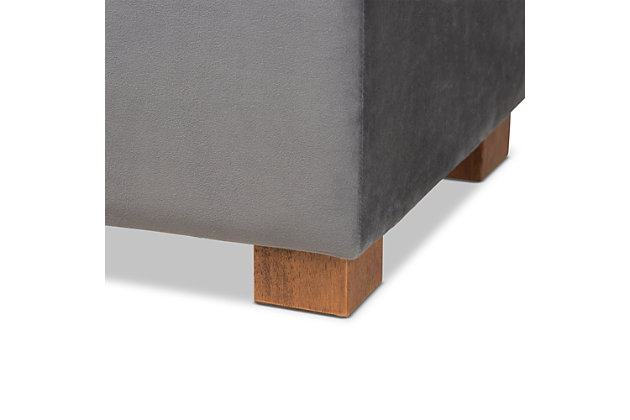 Perfect as a bed end bench for your bedroom or as an accent piece in your living space, the Roanoke storage bench combines handy seating and storage in a stylish way. Constructed with rubberwood, the bench features a cushioned seat upholstered in a soft gray velvet fabric that adds a dose of glamour to your space. The elegant grid-tufted top opens to reveal ample storage space, while walnut brown legs create a strong foundation.Contemporary style | Walnut brown legs | Made of rubberwood, engineered wood, polyester and foam | Upholstered in gray velvet polyester fabric; foam padding | Lift-top storage compartment | Imported | Requires leg assembly