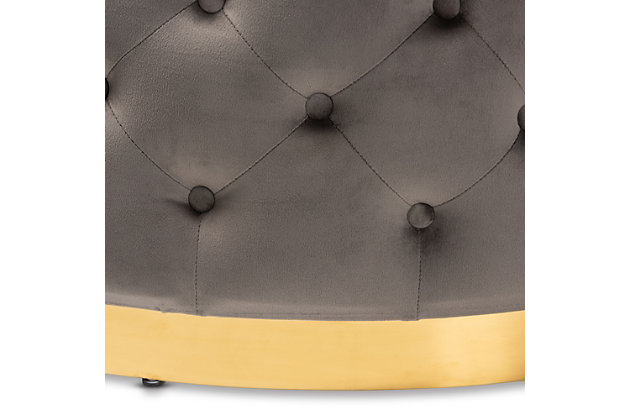 Glamour and versatility define the Sasha ottoman. Padded with foam for the utmost comfort, it's upholstered in a sleek gray velvet fabric that feels incredibly soft to the touch. Elaborate button tufting accentuates the sheen in the velvet, while a goldtone finish on the base adds a hint of luxury. Use this versatile piece as a coffee table, footstool, or extra seating.Contemporary style | Made of wood, metal, polyester and foam | Goldtone base | Upholstered in gray velvet fabric; foam padding | Button tufted | Imported | Arrives fully assembled