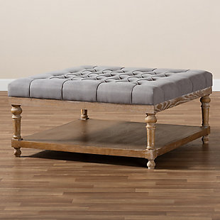 Add a touch of sophisticated grace to your home with the modern-style Kelly cocktail ottoman. The ottoman is fitted with a wood storage shelf to hold books, movies and more. Padded with foam for the utmost comfort, it's upholstered in linen fabric and enhanced with elegant button tufting. Excellent craftsmanship adds a weathered feel to the ottoman, giving it a hint of rustic charm.Contemporary style | Gray linen upholstery; foam padding | Lower storage shelf made of wood and engineered wood; gray wash finish | Assembly required