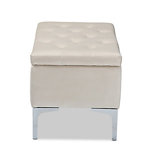 With its functional utility and luxurious style, the Mabel ottoman meets a variety of needs while also looking fabulous. Padded with foam underneath a layer of lavish beige velvet, this piece is soft to the touch and designed to maximize comfort. The ottoman features elaborate button tufting for a modern look. Raised to a practical height by a silvertone metal leg at each corner, this versatile piece can be used as a footrest or extra seating, while also serving as a storage cabinet for busy areas.Contemporary style | Made of velvet, wood, metal and foam | Silvertone legs | Upholstered in beige velvet polyester fabric; foam padding | Lift-up storage compartment | Imported | Assembly required