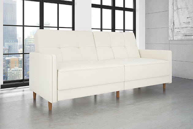 Just because you’re tight on space doesn’t mean you can’t go big on style. Case in point: the Andora coil futon. Clearly inspired by mid-century modern furniture, this high-design futon—upholstered in white faux leather—is dressed to impress with an ultra-linear profile, tufted cushions and slim track armrests. Independently encased coils provide comfort by day and extra support at night when this split-back futon opens up for overnight guests.Wood frame and legs | Foam padding over independently encased coils for superior comfort | Split-back design | Tufted back and seat cushions | Faux leather upholstery | Converts from sofa to sleeper | Assembly required