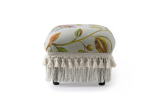 The Fiona Collection by Jennifer Taylor Home is the perfect addition to any living space looking to add a bit of a traditional style. The Fiona is upholstered with high-quality fabric and the solid wood frame is made from kiln-dried birch which provides exceptional support and stability. Crafted beautifully with decorative fringes along the bottom, this ottoman brings class and lounging comfort to any room in the home, whether it’s used as a footrest or additional seating for guests. We offer a unique versatility in design and make use of a variety of trend inspired color palettes and textures to bring new life to any home.Bench-made home furnishing products carefully hand built by experienced craftsmen and women | A sturdy frame of kiln-dried solid hardwood and 11-layer plywood for strength and support that will last | Upholstered in high-quality woven fabric atop premium high-density flame-retardant foam for a luxurious medium firm feel | Petite size is perfect as a footrest in front of a sofa or armchair | Use the footstool as a little step to reach high places | Tassel rope bullion fringe adds a vintage flair