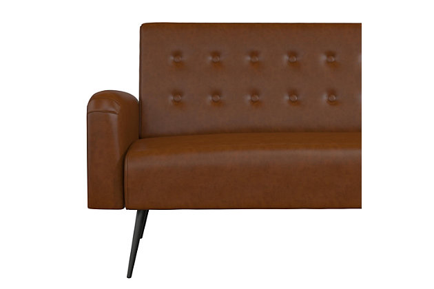 The Novogratz Stevie Futon is the perfect modern sofa bed for those who want practicality without compromising on style. Designed with rounded edges on the armrests, back and seat, the Stevie also features some button tufted detailing in the soft velvet upholstery. This convertible sofa bed is constructed with a strong plywood frame to ensure that it will last you through university and make it into your first apartment. To make this futon even better, the Novogratz Stevie Futon is built with a multi-functional design that allows you to recline the backrest between three position with an easy push or pull. This means you get to choose if you want your futon to be in a sitting position for long hours of studying, in a lounging position for a weekend long movie marathon, or in a sleeping position for hosting your friends overnight during the weekend. Available in multiple trendy colors, the Novogratz Stevie Futon is the ideal option to add a pop of style to your living room, home office or guest bedroom.Modern design upholstered in soft faux leather and featuring button tufted detailing and black metal legs. | Strong plywood frame to ensure stability and durability. | Multi-functional design allows you to recline the backrest between three positions: sitting, lounging and sleeping.