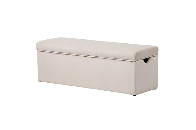 Enhance the look of any space in your house with the ACEssentials Cameron Lift Top Storage Bench. Perfect for storage at the end of your bed or in your living room, the top opens on hinges to provide an ideal spot for pillows, blankets or extra clothes. The cream-colored velvet features a vertical line sewing pattern on its top to create channeling. Providing seating space for two or more, the padded top is a comfortable spot to rest. The cutout side handles make for easy moving from room to room, while the sleek design ensures this piece is a modern accent for your decor. This contemporary bench is the perfect size to use as an ottoman footrest or for extra seating.Made of velvet, wood, foam and plastic | Enhance the look of any space in your house with this storage bench | Perfect for storage at the end of your bed or in your living room;  lift top opens on hinges to provide an ideal spot for pillows, blankets or extra clothes | Vertical sewing line pattern creates channeling | Side handles make for easy moving from room to room | Perfect size to use as an ottoman footrest or for extra seating