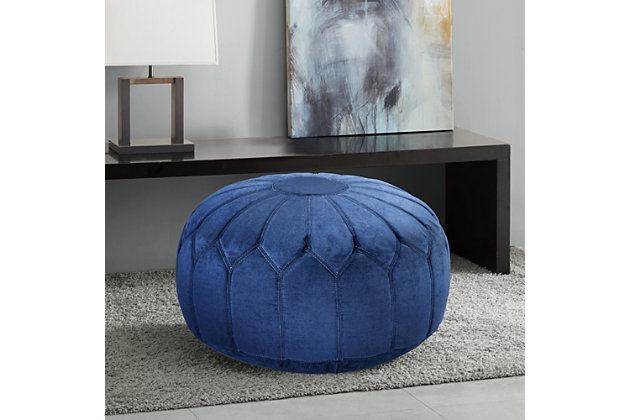 This ottoman pouf makes a comfy, casual statement in any room. Filled with polystyrene beads, the round accent piece is soft and comfortable. Its distinctive stitching pattern adds charming Moroccan style to your existing decor.Made with polyester | Polystyrene bead filling | Weight capacity 300 pounds | No assembly required | Imported