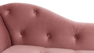 Close-up of tufted back with button