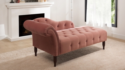 Pink chaise lounge in a bright room