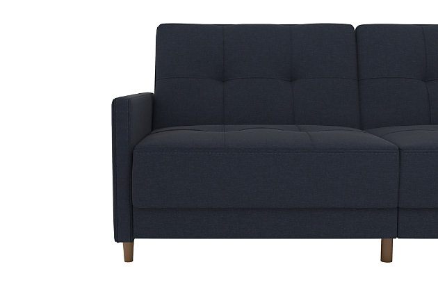 Just because you’re tight on space doesn’t mean you can’t go big on style. Case in point: the Andora coil futon. Clearly inspired by mid-century modern furniture, this high-design futon—upholstered in navy blue linen—is dressed to impress with an ultra-linear profile, tufted cushions and slim track armrests. Independently encased coils provide comfort by day and extra support at night when this split-back futon opens up for overnight guests.Wood frame and legs | Foam padding over independently encased coils for superior comfort | Split-back design | Tufted back and seat cushions | Linen upholstery | Converts from sofa to sleeper | Assembly required