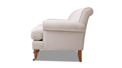 rear three-quarter view of beige sofa