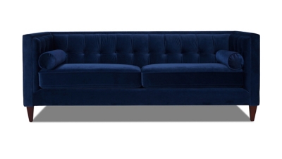 Front view of navy blue sofa with two bolster pillows