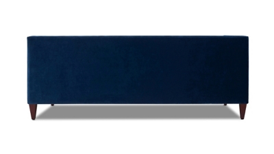 Side view of navy blue sofa with long back and legs