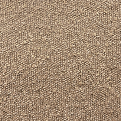 Close-up of the sofa fabric texture in a brown/tan boucle or woven upholstery.