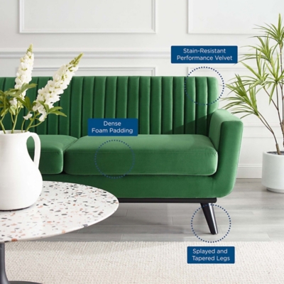 Close-up of sofa arm and cushion with labels pointing features