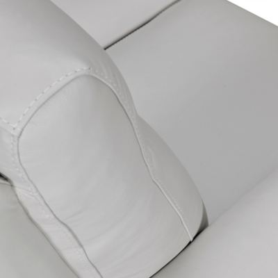 Close-up of stitching on back cushion seam of light gray sofa