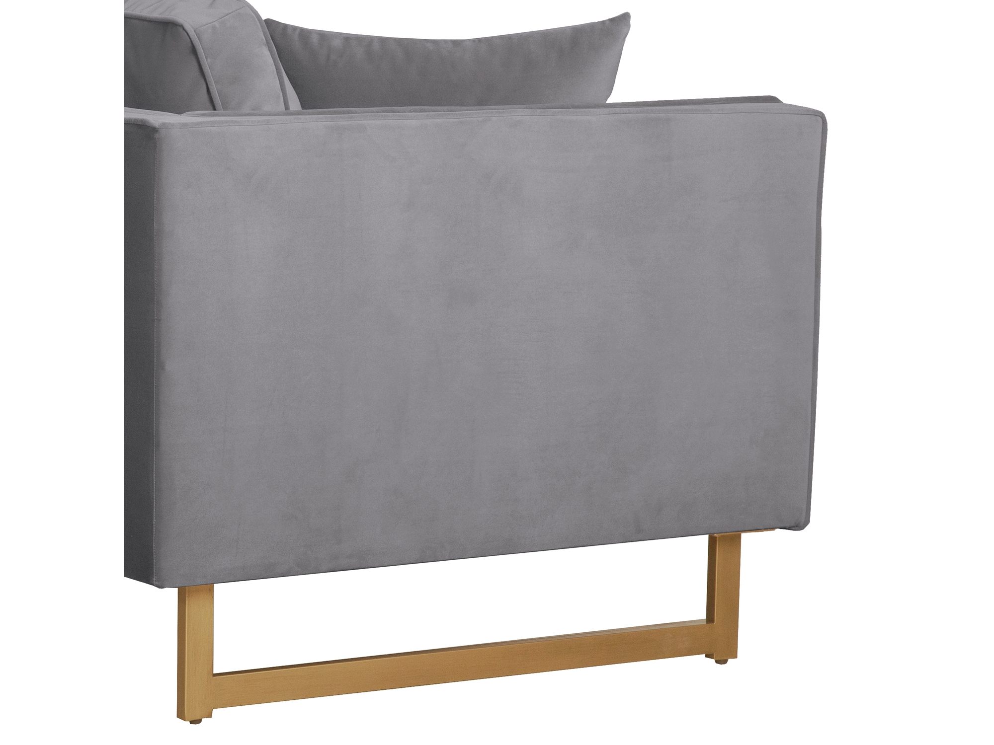 Grey velvet sofa with a square arm design.