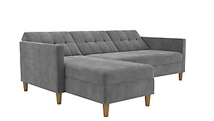 Create your dream living room with the Atwater Living Heidi storage futon with sectional. This contemporary sofa sectional will bring the clean and relaxed look you’ve always dreamed of. The chaise is interchangeable, allowing you to choose from whichever side fits best in your home. And the sofa converts into a lounger or bed within seconds. Whether you’re watching television, lounging around or in need of an extra sleep space, this futon sectional is guaranteed to supply all your needs. It also features extra storage space directly from your chaise compartment, ideal for storing extra pillows and covers.  Easy to assemble and clean, this gray chenille futon with sectional is the perfect marriage of style and function.Sofa with multi-position back and interchangeable chaise | Small space solution  | Chenille upholstery in a gray color | Foam cushions | Storage compartment in chaise | Made of engineered wood, fabric, polyester and foam | Ships in 2 boxes | Assembly required