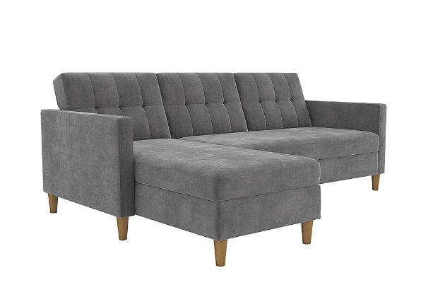 Create your dream living room with the Atwater Living Heidi storage futon with sectional. This contemporary sofa sectional will bring the clean and relaxed look you’ve always dreamed of. The chaise is interchangeable, allowing you to choose from whichever side fits best in your home. And the sofa converts into a lounger or bed within seconds. Whether you’re watching television, lounging around or in need of an extra sleep space, this futon sectional is guaranteed to supply all your needs. It also features extra storage space directly from your chaise compartment, ideal for storing extra pillows and covers.  Easy to assemble and clean, this gray chenille futon with sectional is the perfect marriage of style and function.Sofa with multi-position back and interchangeable chaise | Small space solution  | Chenille upholstery in a gray color | Foam cushions | Storage compartment in chaise | Made of engineered wood, fabric, polyester and foam | Ships in 2 boxes | Assembly required