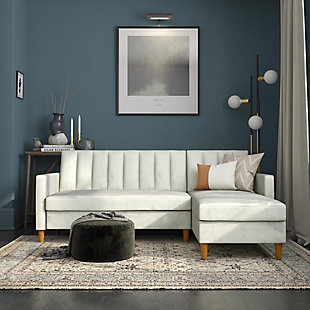 Showcase your trendy style with the Atwater Living Karen futon sectional with storage. This piece exudes comfort and luxury with its light gray velvet upholstery, while vertical stitching on the back adds a splash of flair. Its multifunctional design makes this futon sectional truly versatile, with a split-back couch design that independently converts between three positions: sitting, lounging and sleeping. To top it off, the reclining chaise offers additional storage and can be placed on either side of the sectional, allowing you to create extra room in small spaces.Light gray velvet upholstery and vertical stitching in the backrest | Foam cushions | Chaise can be placed on either side of the sectional | Reclining chaise lifts to provide extra storage | multifunctional split-back couch design that converts between three positions: sitting, lounging and sleeping | Made with wood | Ships in two boxes | Assembly required