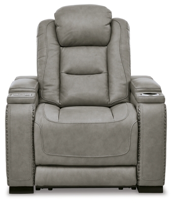 Reserved for him and made for her, The Man-Den power recliner in gray delivers all the comfort and style you could ask for. Inspired by sports car interiors, the seating area is covered in real leather for your pleasure, with a “perforated automotive” treatment for that much more appeal. Positioned at your fingertips, the advanced one-touch power control puts you in the driver’s seat with everything from an Easy View™ power headrest and power lumbar support, to a USB port and wireless charging for your phone. And with an integrated cup holder and hidden storage compartments under the posh, padded armrests, this designer power recliner makes the most of every inch of space.One-touch power control with Easy View™ power adjustable headrest, power lumbar support, USB charging and wireless phone charging | Wireless charger accommodates later model smartphones, including Apple iPhone, Samsung Galaxy, Huawei Mate and Nokia Lumia | Corner-blocked frame with metal reinforced seat | Attached cushions | 43" high back | High-resiliency foam cushions wrapped in thick poly fiber | Leather interior upholstery (with perforated details); vinyl/polyester exterior upholstery | Each armrest includes storage compartment | Cup holder (with 2 layers to accommodate drink containers) | Extended ottoman for enhanced comfort | Nailhead trim | Power cord included; UL Listed | Estimated Assembly Time: 15 Minutes