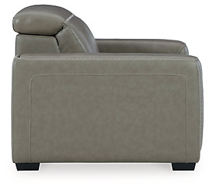 Truly putting high design into recline, the Correze power recliner with genuine leather seating area proves that just because you’re a recliner doesn’t mean you have to look like one. Deceptively beautiful, its ultra clean-lined aesthetic is as cool and contemporary as they come. Low-profile back has a super swank look. When you need more support for your head and neck, the press of a button engages the Easy View™ power adjustable headrest, designed to let you lean back and still have a primo view of the TV. Ever-so-subtle curves and stunning stitching perfect the aesthetic.Includes 2 pieces: right-arm facing arm and left-arm facing zero wall power recliner | One-touch power control with adjustable positions, Easy View™ adjustable headrest and zero-draw USB plug-in | Zero-draw technology only consumes power when the USB receptacle is in use | Zero wall design requires minimal space between wall and chair back | Corner-blocked frame with metal reinforced seat | Attached back and seat cushions | High-resiliency foam cushions wrapped in thick poly fiber | Extended ottoman for enhanced comfort | Leather interior upholstery; vinyl/polyester exterior upholstery | Power cord included; UL Listed | Exposed feet with faux wood finish | Estimated Assembly Time: 35 Minutes