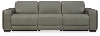 Truly putting high design into recline, the Correze power sofa with genuine leather seating area proves that just because you’re a recliner doesn’t mean you have to look like one. Deceptively beautiful, its ultra clean-lined aesthetic is as cool and contemporary as they come. Low-profile back has a super swank look. When you need more support for your head and neck, the press of a button engages the Easy View™ power adjustable headrest, designed to let you lean back and still have a primo view of the TV. Ever-so-subtle curves and stunning stitching perfect the aesthetic.Includes 3 pieces: armless chair, left-arm facing zero wall power recliner and right-arm facing zero wall power recliner | One-touch power control with adjustable positions, Easy View™ adjustable headrest and zero-draw USB plug-in | Zero-draw technology only consumes power when the USB receptacle is in use | Zero wall design requires minimal space between wall and chair back | Corner-blocked frame with metal reinforced seat | Attached back and seat cushions | High-resiliency foam cushions wrapped in thick poly fiber | Extended ottoman for enhanced comfort | Leather interior upholstery; vinyl/polyester exterior upholstery    | Power cord included; UL Listed | Exposed feet with faux wood finish | "Left-arm" and "right-arm" describe the position of the arm when you face the piece | Estimated Assembly Time: 55 Minutes