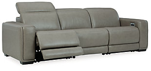 Truly putting high design into recline, the Correze power sofa with genuine leather seating area proves that just because you’re a recliner doesn’t mean you have to look like one. Deceptively beautiful, its ultra clean-lined aesthetic is as cool and contemporary as they come. Low-profile back has a super swank look. When you need more support for your head and neck, the press of a button engages the Easy View™ power adjustable headrest, designed to let you lean back and still have a primo view of the TV. Ever-so-subtle curves and stunning stitching perfect the aesthetic.Includes 3 pieces: armless chair, left-arm facing zero wall power recliner and right-arm facing zero wall power recliner | One-touch power control with adjustable positions, Easy View™ adjustable headrest and zero-draw USB plug-in | Zero-draw technology only consumes power when the USB receptacle is in use | Zero wall design requires minimal space between wall and chair back | Corner-blocked frame with metal reinforced seat | Attached back and seat cushions | High-resiliency foam cushions wrapped in thick poly fiber | Extended ottoman for enhanced comfort | Leather interior upholstery; vinyl/polyester exterior upholstery    | Power cord included; UL Listed | Exposed feet with faux wood finish | "Left-arm" and "right-arm" describe the position of the arm when you face the piece | Estimated Assembly Time: 55 Minutes