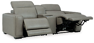 Truly putting high design into recline, the Correze power loveseat with genuine leather seating area proves that just because you’re a recliner doesn’t mean you have to look like one. Deceptively beautiful, its ultra clean-lined aesthetic is as cool and contemporary as they come. Low-profile back has a super swank look. When you need more support for your head and neck, the press of a button engages the Easy View™ power adjustable headrest, designed to let you lean back and still have a primo view of the TV. Ever-so-subtle curves and stunning stitching perfect the aesthetic.Includes 3 pieces: console with storage, left-arm facing zero wall power recliner and right-arm facing zero wall power recliner | One-touch power control with adjustable positions, Easy View™ adjustable headrest and zero-draw USB plug-in | Zero-draw technology only consumes power when the USB receptacle is in use | Zero wall design requires minimal space between wall and chair back | Corner-blocked frame with metal reinforced seat | Attached back and seat cushions | High-resiliency foam cushions wrapped in thick poly fiber | Extended ottoman for enhanced comfort | Leather interior upholstery; vinyl/polyester exterior upholstery    | Console with storage and 2 cup holders | Power cord included; UL Listed | Exposed feet with faux wood finish | "Left-arm" and "right-arm" describe the position of the arm when you face the piece | Estimated Assembly Time: 55 Minutes