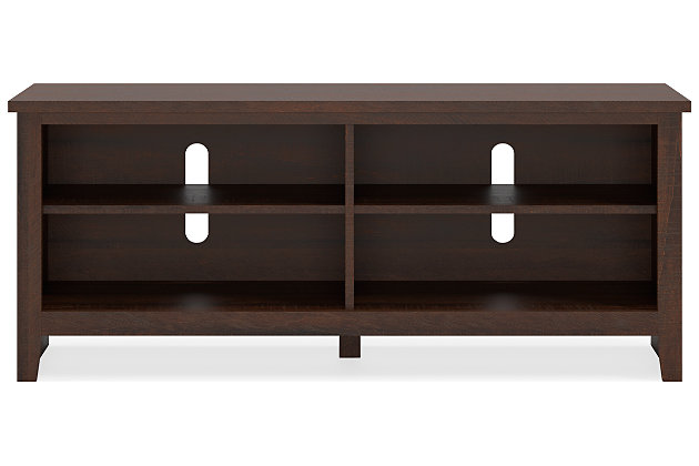 With its replicated burnt umber rustic wood grain and minimalist charm, the Camiburg TV stand is right in tune with your relaxed approach to high style. Beautifully made to accommodate your media equipment, it’s well equipped with a flexible, open-concept design and cutouts for wire management that enhance the clean-lined aesthetic. The look is ideal for modern farmhouse and contemporary settings.Made of decorative laminate and engineered wood | Replicated burnt umber rustic wood grain; warm brown finish | 2 shelves (4 open compartments) | Cutouts for wire management | Assembly required
