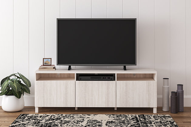 Grace your entertainment space (or home office or dining room for that matter) with the masterfully styled and wonderfully versatile Dorrinson TV stand. Sporting an antique white aesthetic and sleek hardware-free design, it’s beautifully in tune with your less-is-more sensibility.Made of engineered wood and decorative laminate | Antique white finish | 3 cabinet doors | 3 open cubbies | 3 adjustable shelves with cord management holes | Assembly required | Estimated Assembly Time: 60 Minutes