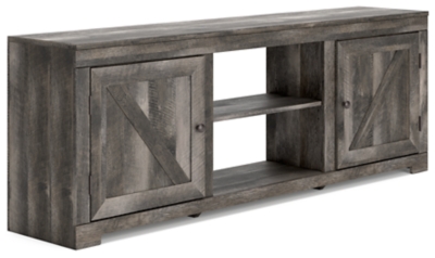 The Bellaby Whitewash 4 Pc. Entertainment Center 63 TV Stand is available  at Discount Furniture Center proudly serving South Hill and Farmville, VA  and surrounding areas!