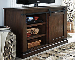 Add a touch of country style to your living area with the Budmore 50" TV stand. It’s visually appealing with the flexibility you need. Four adjustable shelves are found behind a barn door that you can easily slide from one side to the other. For an uncluttered look, close up either side of the stand to create a casual feel, great for hiding audio-visual essentials when not in use—what a concept.Made of veneers, wood and engineered wood with metal components | 4 adjustable shelves | 1 sliding barn door with wheels and track | Industrial black finished hardware | Assembly required | Excluded from promotional discounts and coupons | Estimated Assembly Time: 30 Minutes