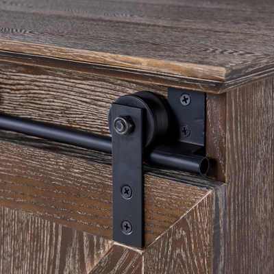 Close-up of sliding barn door hardware and roller