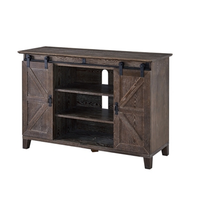 Close-up view of wooden TV console with barn-door design