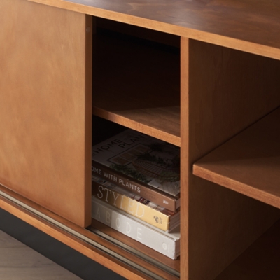 Inside view of storage compartment showing magazine/books