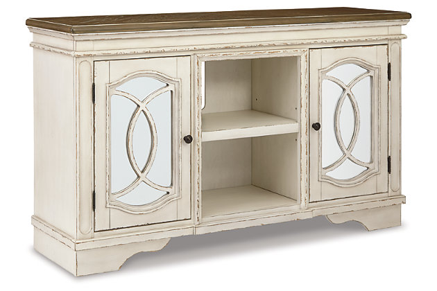 Elevating the art of traditional cottage styling, the Realyn TV stand is sure to serve you beautifully for years to come. Antiqued two-tone finish blends a chipped white with a distressed wood tone top for added charm. Cabinet door features inset mirror with filigree moulding for a fanciful twist.Made with poplar wood, oak and birch veneers and engineered wood | Two-tone finish (chipped white case and distressed wood tone top) | 2 cabinet doors with inset mirrors and filigree mouldings | Cutouts for wire management and ventilation | Removable/adjustable center shelf | 4 adjustable side shelves | Dark bronze-tone metal hardware | Assembly required | Estimated Assembly Time: 30 Minutes