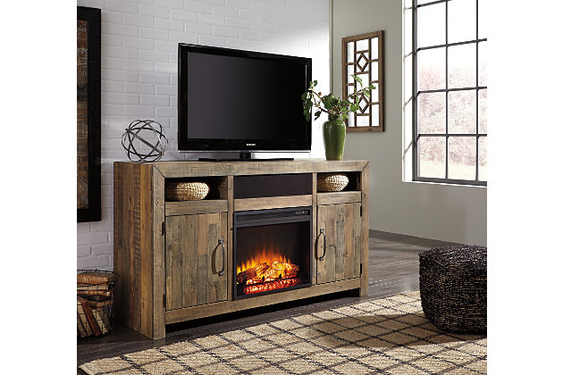 The Sommerford TV stand sets a casual mood in the heart of the city. Its earthy style is clean, yet sophisticated, with a rustic gray-brown finish and planked top—an homage to reclaimed barn wood. Bring a touch of romance and warmth to the scene with the addition of an electric fireplace insert (sold separately).TV stand only | Made of solid pine wood | 2 side cabinets | 3 storage cubbies | 2 center shelves (1 adjustable) | 2 doors | Compatible with W100-101 and W100-02 fireplace inserts | Excluded from promotional discounts and coupons | Estimated Assembly Time: 30 Minutes
