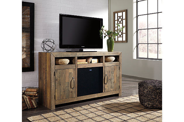 The Sommerford TV stand sets a casual mood in the heart of the city. Its earthy style is clean, yet sophisticated, with a rustic gray-brown finish and planked top—an homage to reclaimed barn wood. Bring a touch of romance and warmth to the scene with the addition of an electric fireplace insert (sold separately).TV stand only | Made of solid pine wood | 2 side cabinets | 3 storage cubbies | 2 center shelves (1 adjustable) | 2 doors | Compatible with W100-101 and W100-02 fireplace inserts | Excluded from promotional discounts and coupons | Estimated Assembly Time: 30 Minutes